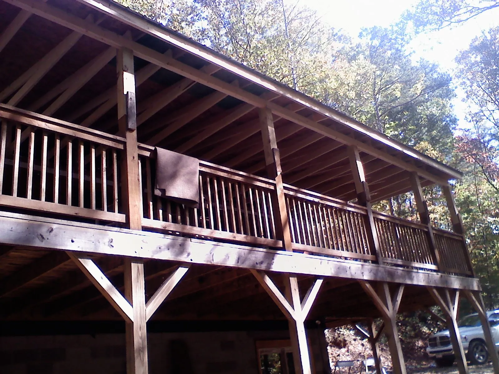 Timber framing under a new elevated porch and deck — Roof Leak Repair in Tulare by Roofing Brothers